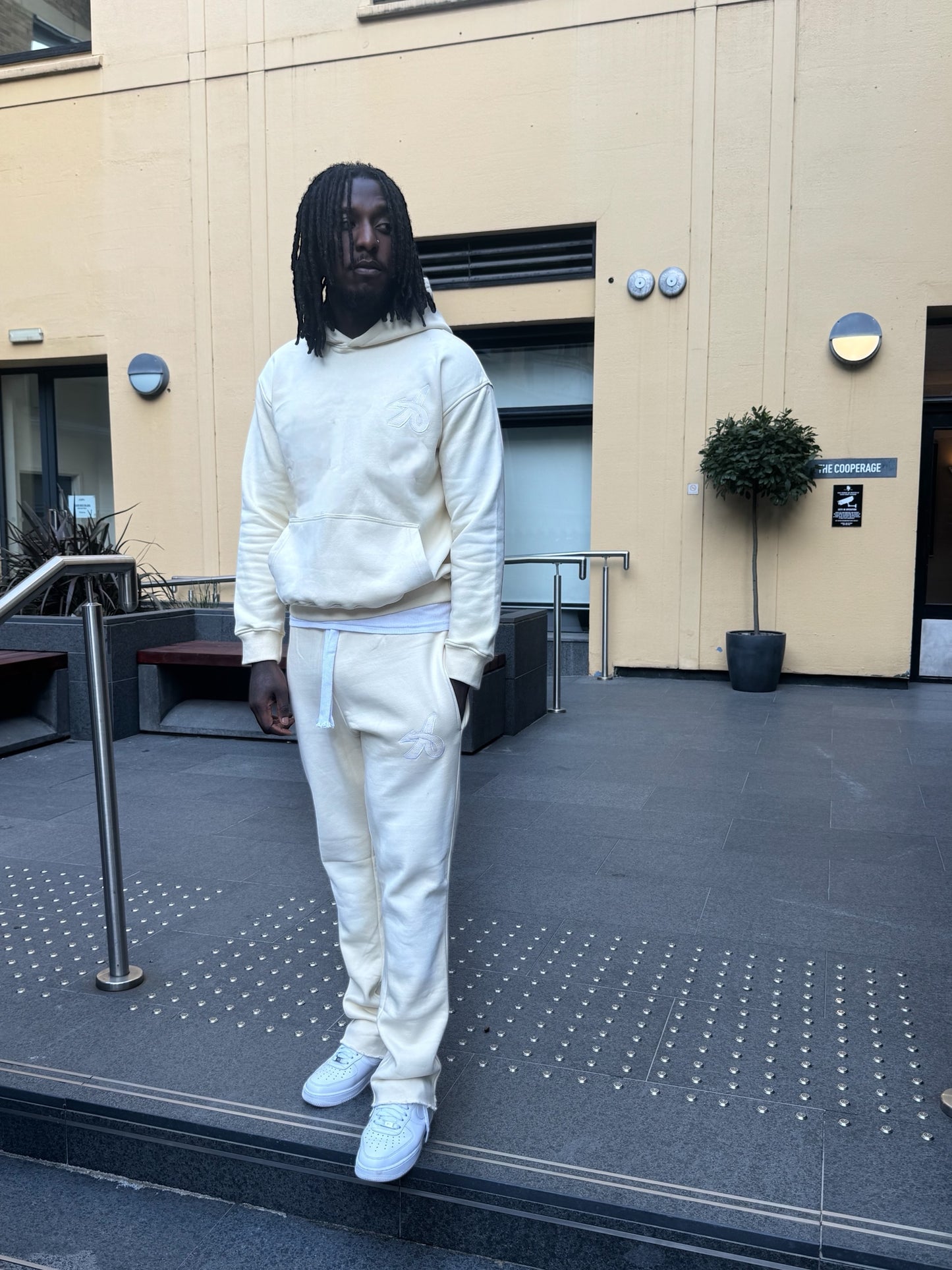 CAN'T STOP BEIGE SUNFADE DISTRESSED FLARES